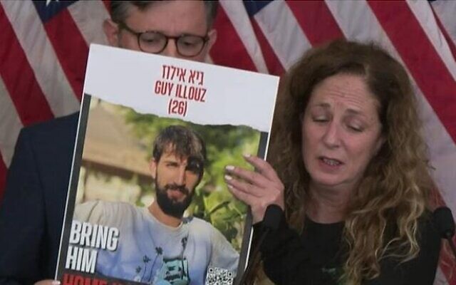 Doris Liber holds up a photo of her son Guy Illouz, who is being held hostage by terrorists in Gaza, during a press conference on Capitol Hill in the US on November 7, 2023. (Screen capture/C-SPAN) Doris Liber holds up a photo of her son Guy Illouz, who is being held hostage by terrorists in Gaza, during a press conference on Capitol Hill in the US on November 7, 2023. (Screen capture/C-SPAN)