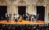 Illustrative: Musicians perform at Het Koninklijk Concertgebouw in Amsterdam, the Netherlands during a benefit concert for Israelis and Gazans on November 1, 2023. (Courtesy of Barry Mehler)