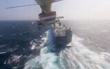 Iran-backed Houthis in Yemen publish a video showing how the group hijacked an Israeli-linked shipping vessel in the Red Sea on November 20, 2023. (Screen capture/X)