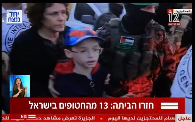 Hamas terrorists transfer Ohad Munder to the Red Cross in Khan Younis on November 24, 2023. (Screen capture/X) Hamas terrorists transfer Ohad Munder to the Red Cross in Khan Younis on November 24, 2023. (Screen capture/X)