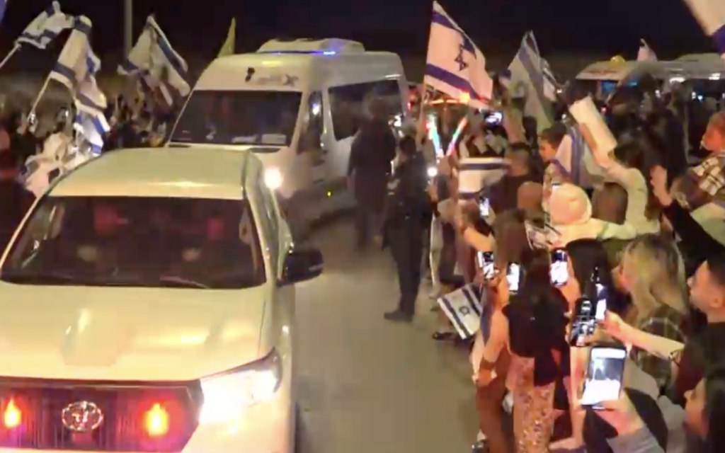 12 Israeli hostages arrive at Hatzerim base in Israel after their release from Hamas captivity, November 26, 2023. (Screenshot)