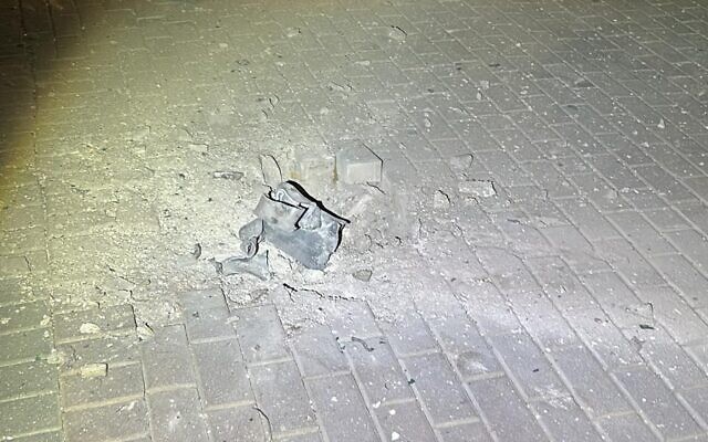 This handout photo shows a rocket fired by Palestinian terrorists in the Gaza Strip after landing on a street in the southern city of Sderot, November 4, 2023. (Sderot Municipality) This handout photo shows a rocket fired by Palestinian terrorists in the Gaza Strip after landing on a street in the southern city of Sderot, November 4, 2023. (Sderot Municipality)