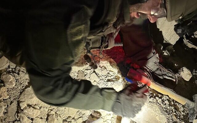 IDF soldiers work to uncover a terror tunnel during a raid in the West Bank city of Jenin on November 1, 2023 (Israel Defense Forces) IDF soldiers work to uncover a terror tunnel during a raid in the West Bank city of Jenin on November 1, 2023 (Israel Defense Forces)