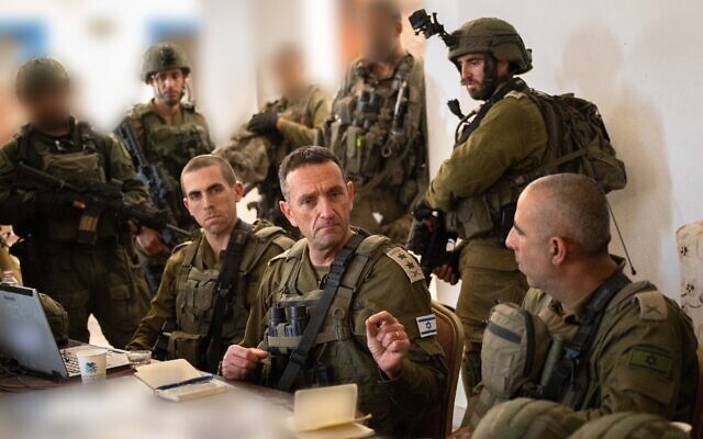 IDF Chief of Staff Lt. Gen. Herzi Halevi (center) speaks with officers inside a building in the Gaza Strip, November 4, 2023. (Israel Defense Forces) IDF Chief of Staff Lt. Gen. Herzi Halevi (center) speaks with officers inside a building in the Gaza Strip, November 4, 2023. (Israel Defense Forces)