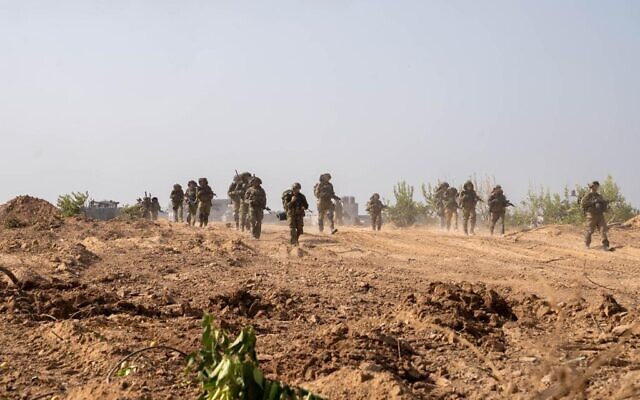 IDF soldiers in northern Gaza in a handout photo from November 11, 2023. (Israel Defense Forces)