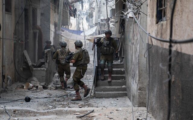 IDF soldiers in the Gaza Strip in a handout photo distributed on November 20, 2023. (Israel Defense Forces) IDF soldiers in the Gaza Strip in a handout photo distributed on November 20, 2023. (Israel Defense Forces)