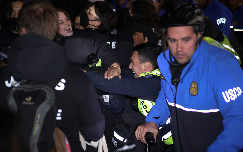 Members of the US Capitol Police pull protesters away from the headquarters of the Democratic National Committee during a far-left demonstration against the war between Israel and Hamas on November 15, 2023 on Capitol Hill in Washington. (Alex Wong/Getty Images/AFP) Members of the US Capitol Police pull protesters away from the headquarters of the Democratic National Committee during a far-left demonstration against the war between Israel and Hamas on November 15, 2023 on Capitol Hill in Washington. (Alex Wong/Getty Images/AFP)