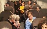 The hostages released by Hamas in an ambulance en route to Israel on November 24, 2023. (Screen capture: Youm7)