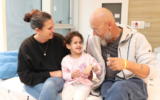 Avigail Idan is reunited with her aunt Liron and uncle Zuli at the Schneider children's hospital on November 27, 2023. (Schneider hospital)