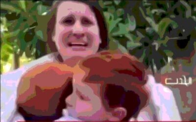 Shiri Bibas and her sons Ariel, 4, and baby Kfir, are abducted from Kibbutz Nir Oz by Hamas terrorists on October 7, 2023. (Posterized screenshot)
