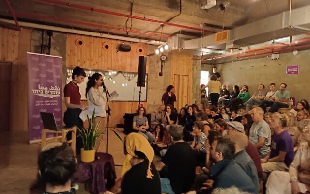 Introductory speakers Aya Khatib and Shir Nehamkin at a meeting organized by coexistence group Standing Together at the Feelbeit cafe, Jerusalem, November 13, 2023 (Gianluca Pacchiani / Times of Israel) Introductory speakers Aya Khatib and Shir Nehamkin at a meeting organized by coexistence group Standing Together at the Feelbeit cafe, Jerusalem, November 13, 2023 (Gianluca Pacchiani / Times of Israel)