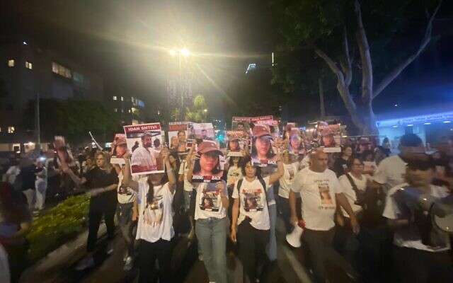Protesters march in Tel Aviv to demand the return of hostages held by Hamas and other terror groups in Gaza, November 11, 2023 ((Dafna Yosha)