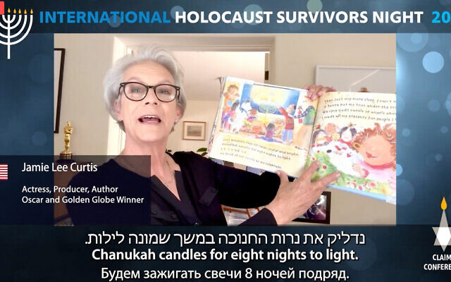 Actor Jamie Lee Curtis reads a page from her children's book during remarks at the Claims Conference's virtual event, December 11, 2023. (Screen capture) Actor Jamie Lee Curtis reads a page from her children's book during remarks at the Claims Conference's virtual event, December 11, 2023. (Screen capture)