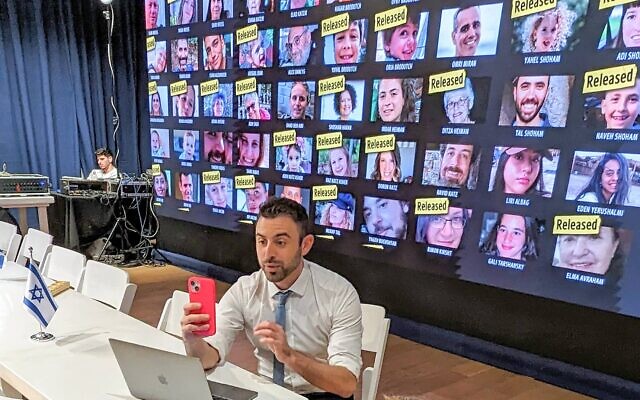Israeli government spokesman Eylon Levy films a TikTok clip, November 2023. (Avner Hofstein / Zman Yisrael)