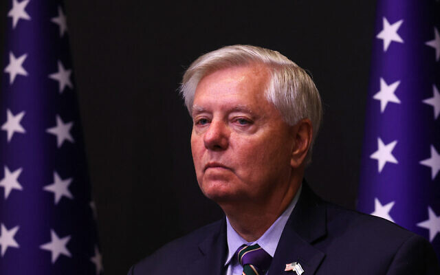 Member of a bipartisan group of US senators Lindsey Graham looks on during a press conference in Tel Aviv on October 22, 2023. (GIL COHEN MAGEN / AFP) Member of a bipartisan group of US senators Lindsey Graham looks on during a press conference in Tel Aviv on October 22, 2023. (GIL COHEN MAGEN / AFP)