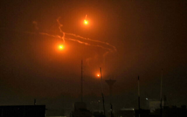 A picture taken from Rafah, in the southern Gaza Srip, shows flares dropped during an Israeli bombardment on December 4, 2023, amid the ongoing war between Israel and the Palestinian terror group Hamas. (Said Khatib/AFP) A picture taken from Rafah, in the southern Gaza Srip, shows flares dropped during an Israeli bombardment on December 4, 2023, amid the ongoing war between Israel and the Palestinian terror group Hamas. (Said Khatib/AFP)