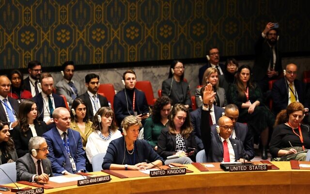 US Deputy Ambassador to the UN Robert Wood (2nd R) raises his hand during a United Nations Security Council vote about a ceasefire in Gaza at UN headquarters in New York on December 8, 2023. The United States vetoed a resolution that would have called for an immediate ceasefire in the intense fighting between Israel and Hamas in Gaza. Wood, said the resolution was "divorced from reality." (Photo by Charly TRIBALLEAU / AFP)