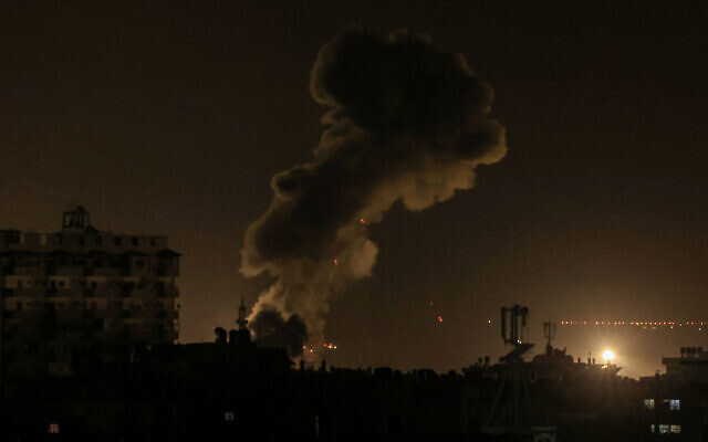 A picture taken from the Palestinian city of Rafah shows smoke billowing in the southern Gaza Strip during an Israeli strike on December 11, 2023 (Photo by SAID KHATIB / AFP) A picture taken from the Palestinian city of Rafah shows smoke billowing in the southern Gaza Strip during an Israeli strike on December 11, 2023 (Photo by SAID KHATIB / AFP)