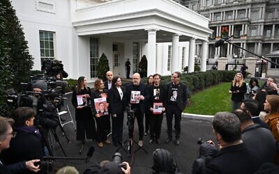Family members of US-Israeli hostages held by Hamas speak to the press outside the White House in Washington, December 13, 2023, after a meeting with US President Joe Biden. (Jim WATSON / AFP)