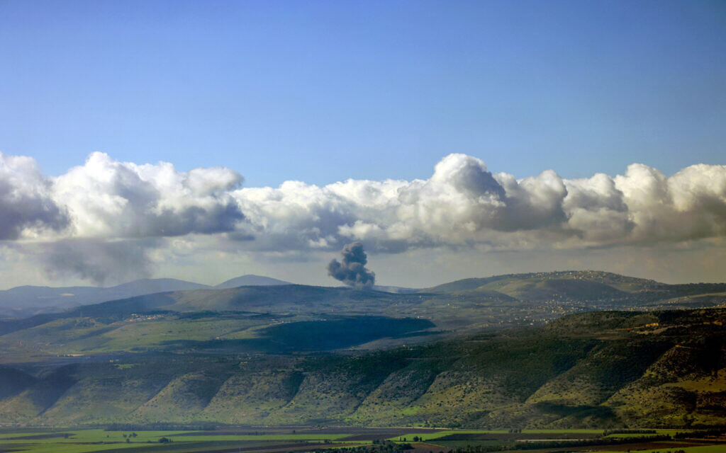 Smoke billows across the horizon along the hills in southern Lebanon following Israeli strikes from a position along the border in northern Israel on December 14, 2023. (Photo by Jalaa Marey / AFP)