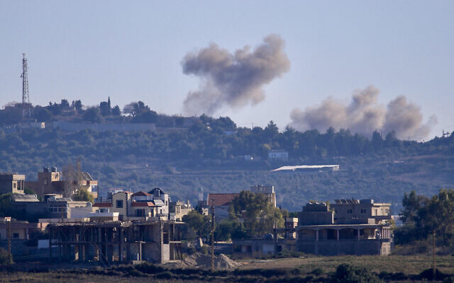 A picture taken from from the southern Lebanese village of Tayr Harfa, near the border with Israel shows smoke billowing near an Israeli outpost from rockets fired by Hezbollah on December 15, 2023. (AFP) A picture taken from from the southern Lebanese village of Tayr Harfa, near the border with Israel shows smoke billowing near an Israeli outpost from rockets fired by Hezbollah on December 15, 2023. (AFP)