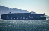 Illustrative: The 'CMA CGM Palais Royal,' the world's largest container ship powered by natural gas, sails in the bay of Marseille, southern France, on December 14, 2023. (Christophe Simon/AFP)