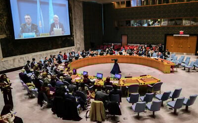 Tor Wennesland (right on screen), special coordinator for the Middle East peace process, speaks from Jerusalem during a UN Security Council meeting on "the situation in the Middle East, including the Palestinian question," at the UN headquarters in New York City on December 19, 2023. (Charly Triballeau/AFP)