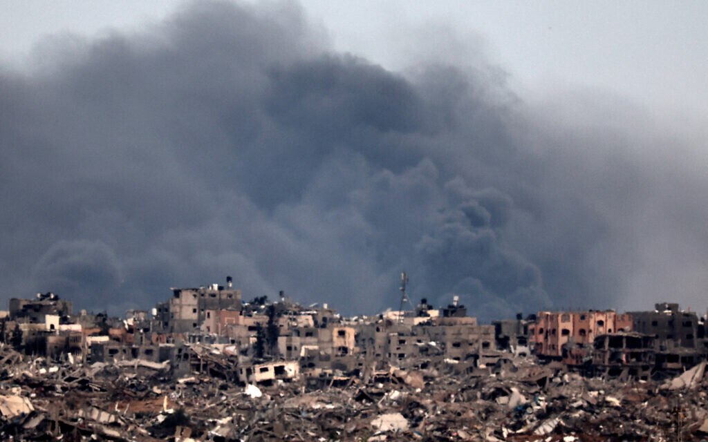 A picture taken from southern Israel near the border with the Gaza Strip on December 21, 2023, shows smoke billowing following IDF air strikes. (JACK GUEZ / AFP)
