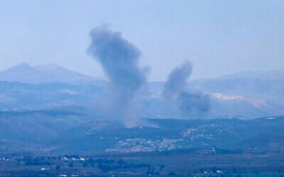 This picture taken from the Israeli side of border with Lebanon shows smoke billowing following Israeli bombardment in southern Lebanon on December 21, 2023 (Jalaa Marey / AFP)