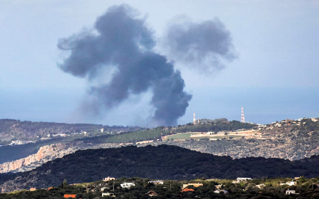 Smoke billows across the horizon along the hills in the Naqura area of southern Lebanon following Israeli strikes on December 24, 2023. (Jalaa MAREY / AFP)