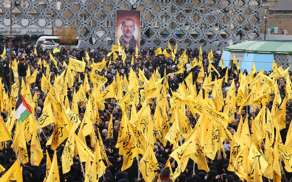 Mourners attend the funeral of Razi Moussavi, a senior commander in the Quds Force of Iran's Islamic Revolutionary Guard Corps (IRGC) who was killed on December 25 in an alleged Israeli strike in Syria, in Tehran, on December 28, 2023. (Atta Kenare/AFP)