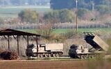 Israeli rocket launchers seen deployed in the Upper Galilee in northern Israel near the border with Lebanon on December 28, 2023. (jalaa marey / AFP)