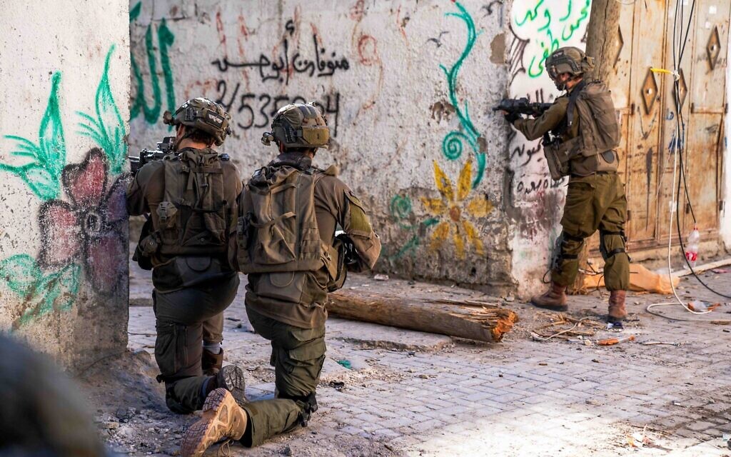 This handout photo distributed by the Israel Defense Forces on December 13, 2023, shows troops operating in the Gaza Strip amid the war against Hamas. (Israel Defense Forces)