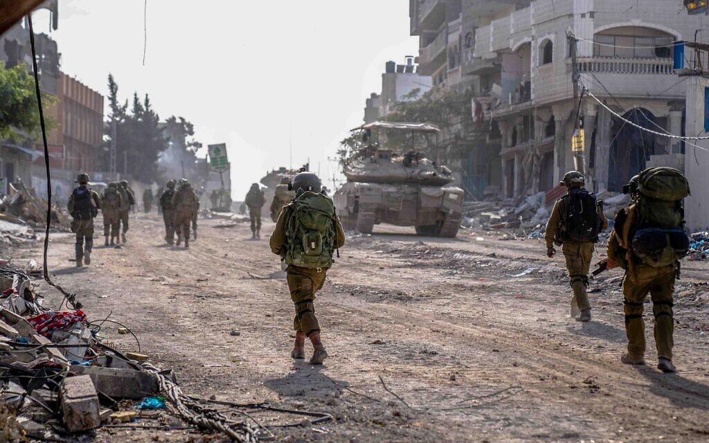 This handout photo distributed by the Israel Defense Forces on December 13, 2023, shows troops operating in the Gaza Strip amid the war against Hamas. (Israel Defense Forces)