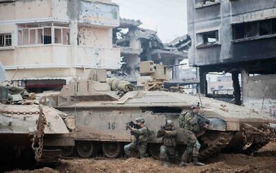 Israeli troops operate in the Gaza Strip in a photo released December 20, 2023 (Israel Defense Forces)