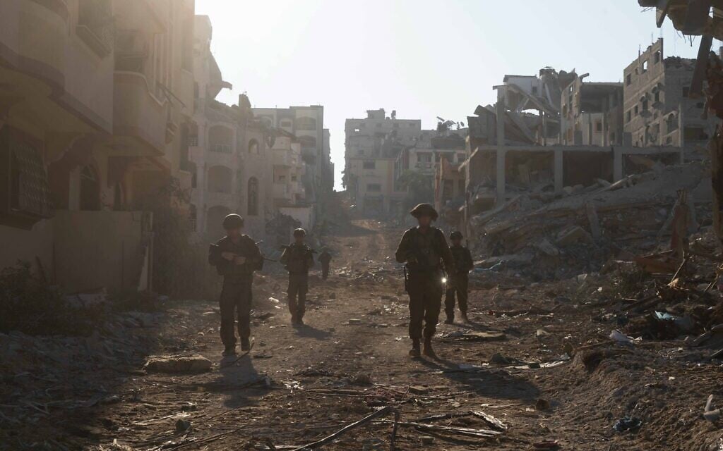 IDF troops seen operating in the Gaza Strip in a handout photo released December 24, 2023. (Israel Defense Forces)