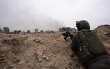 IDF troops seen operating in the Gaza Strip in a handout photo released December 25, 2023. (Israel Defense Forces)