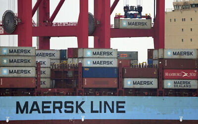 Illustrative -- The 'Vilnia Maersk' container vessel is unloaded at the 'Jade Weserport' container terminal in Wilhelmshaven, Germany, November 15, 2022. (AP Photo/Michael Sohn)