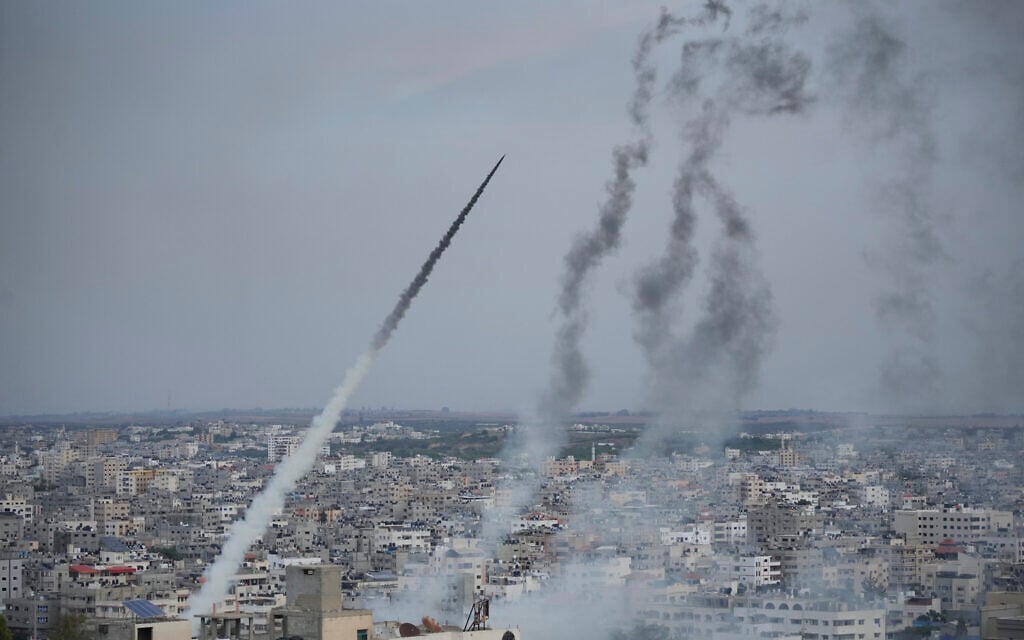 Rockets are launched by Palestinian terrorists from the Gaza Strip toward Israel, in Gaza, October 7, 2023. (AP Photo/ Hatem Moussa)