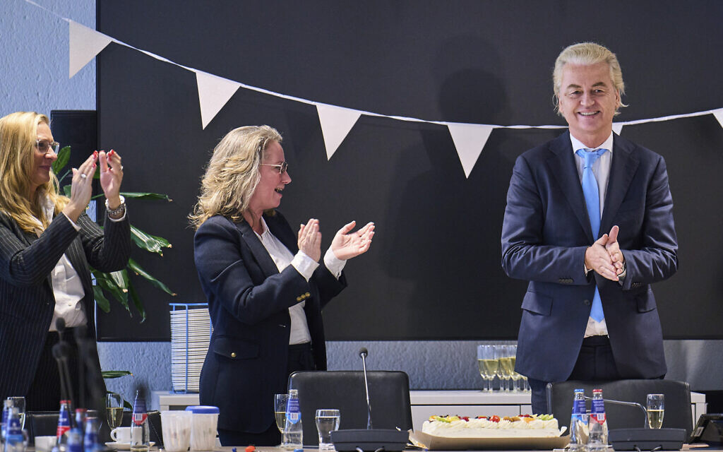 Far-right Party for Freedom leader Geert Wilders, right, celebrates with Fleur Agema, section left, and other party members after winning the most votes in a general election, in The Hague, Netherlands, November 23, 2023. (AP Photo/Phil Nijhuis) Far-right Party for Freedom leader Geert Wilders, right, celebrates with Fleur Agema, section left, and other party members after winning the most votes in a general election, in The Hague, Netherlands, November 23, 2023. (AP Photo/Phil Nijhuis)
