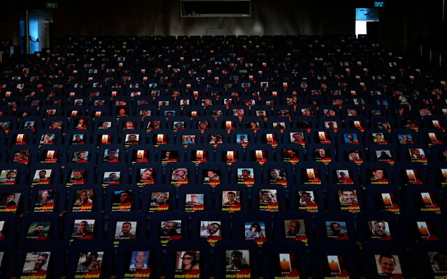 Photographs of over one thousand persons killed, missing or abducted in the Hamas attack on Israel on Oct. 7 are displayed on empty seats in an exhibit held under the motto "UNITED AGAINST TERRORISM" in the Smolarz Auditorium at Tel Aviv University on Oct. 22, 2023, in Tel Aviv. (AP Photo/Ohad Zwigenberg, File) Photographs of over one thousand persons killed, missing or abducted in the Hamas attack on Israel on Oct. 7 are displayed on empty seats in an exhibit held under the motto "UNITED AGAINST TERRORISM" in the Smolarz Auditorium at Tel Aviv University on Oct. 22, 2023, in Tel Aviv. (AP Photo/Ohad Zwigenberg, File)