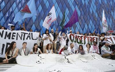 File: Pro-Palestinian demonstrators call for a ceasefire in the Israel-Hamas war during the COP28 UN Climate Summit, in Dubai, United Arab Emirates, on December 3, 2023. (AP Photo/Peter Dejong)