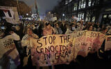 Demonstrators march west towards the UC Townhomes during an anti-Israel, pro-Palestinian rally in Philadelphia, Sunday, December 3, 2023. (Elizabeth Robertson/The Philadelphia Inquirer via AP)