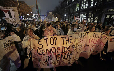 Demonstrators march west towards the UC Townhomes during an anti-Israel, pro-Palestinian rally in Philadelphia, Sunday, December 3, 2023. (Elizabeth Robertson/The Philadelphia Inquirer via AP)