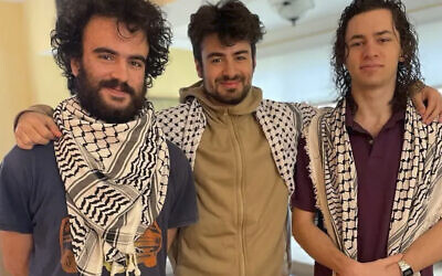 In this Nov. 23, 2023, photo provided by family attorney Abed Ayoub, three college students, from the left, Tahseen Ali Ahmad, Kinnan Abdalhamid, and Hisham Awartani, stand together for a photograph. (Rich Price via AP, File)