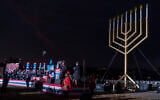 Doug Emhoff, husband of US Vice President Kamala Harris, speaks during the National Chanukah Menorah lighting, December 7, 2023, on the ellipse of the White House complex in Washington. (AP Photo/Jacquelyn Martin)