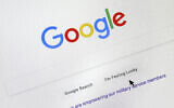 File: A cursor moves over Google's search engine page, in Portland, Oregan, on August 28, 2018. (AP Photo/Don Ryan)