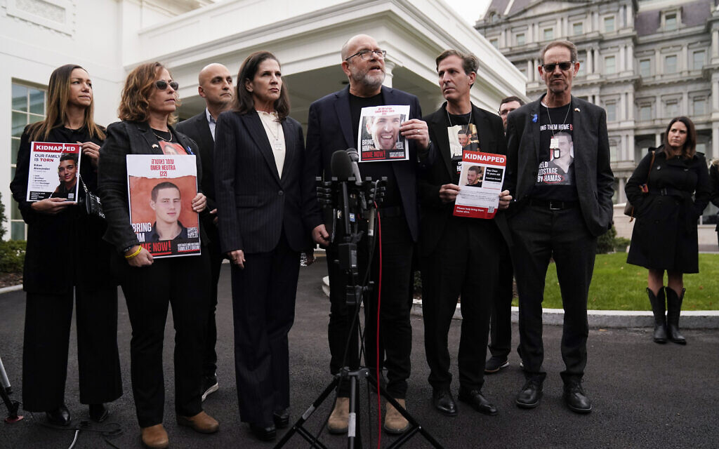Jonathan Dekel-Chen, father of Gaza hostage Sagui Dekel-Chen, speaks to reporters alongside other relatives of American hostages taken hostage to Gaza during the October 7 terror attacks in Israel, after a meeting with US President Joe Biden in Washington, December 13, 2023. (AP Photo/Evan Vucci)