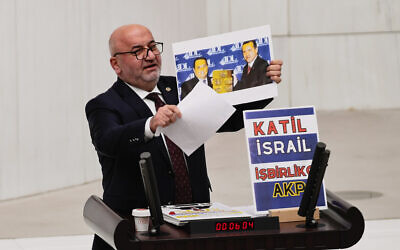 Hasan Bitmez, a Turkish lawmaker from the Islamist Saadet Partisi, speaks at the main chamber of the Turkish parliament in Ankara, December 12, 2023. (Selahattin Sonmez/Dia Images via AP)