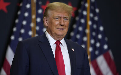 Former US president Donald Trump speaks during a commit to caucus rally, December 19, 2023, in Waterloo, Iowa. (AP Photo/Charlie Neibergall)